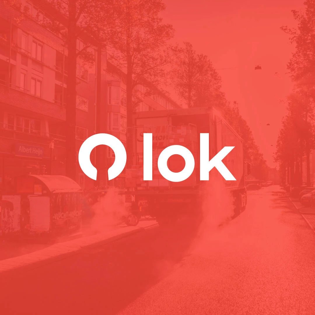 LOK mark over a city delivery street scene