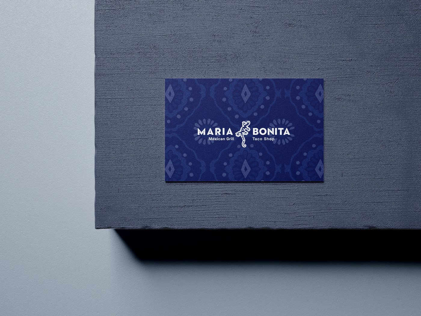 María Bonita business card with a patterned back