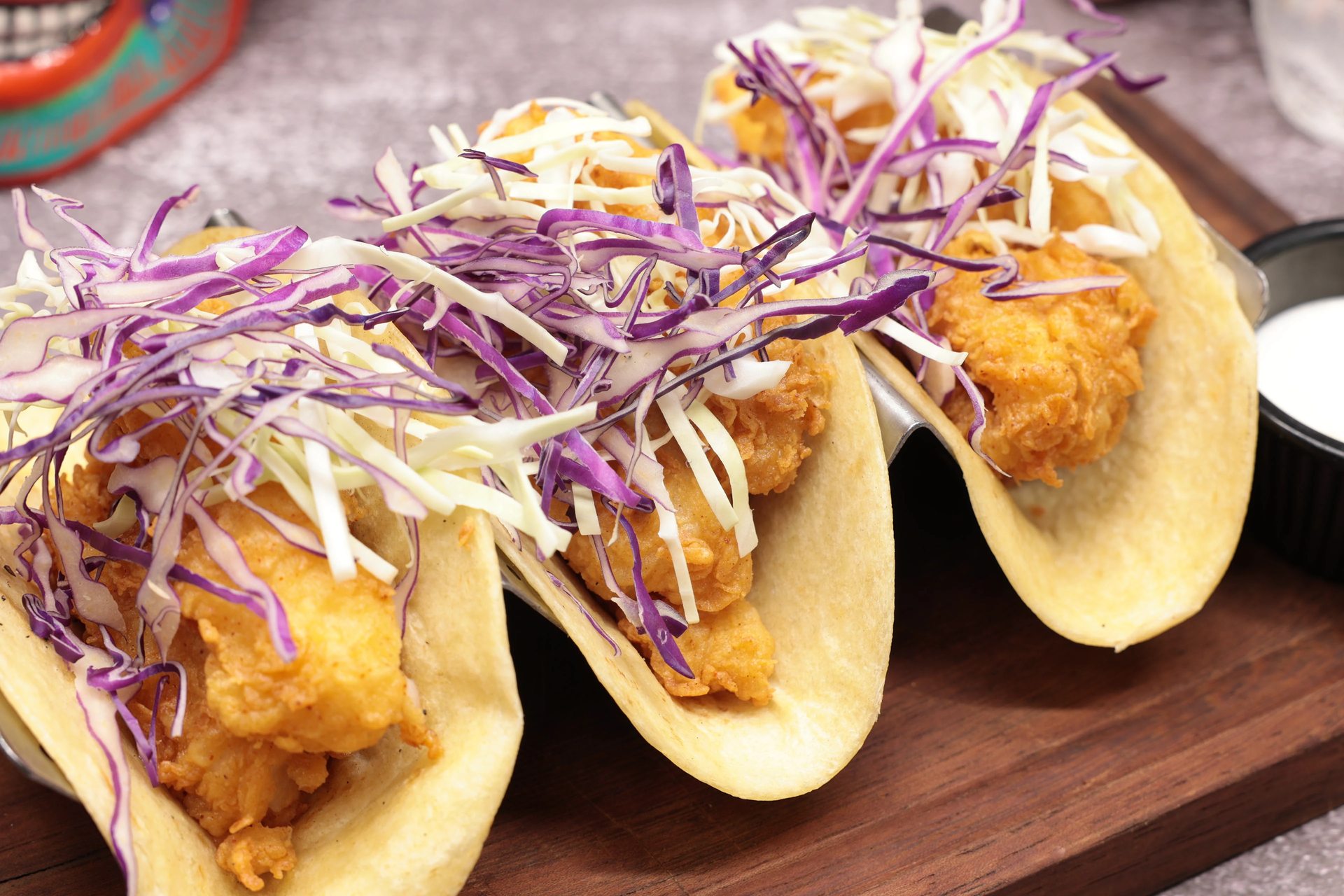 María Bonita tacos topped with cabbage slaw