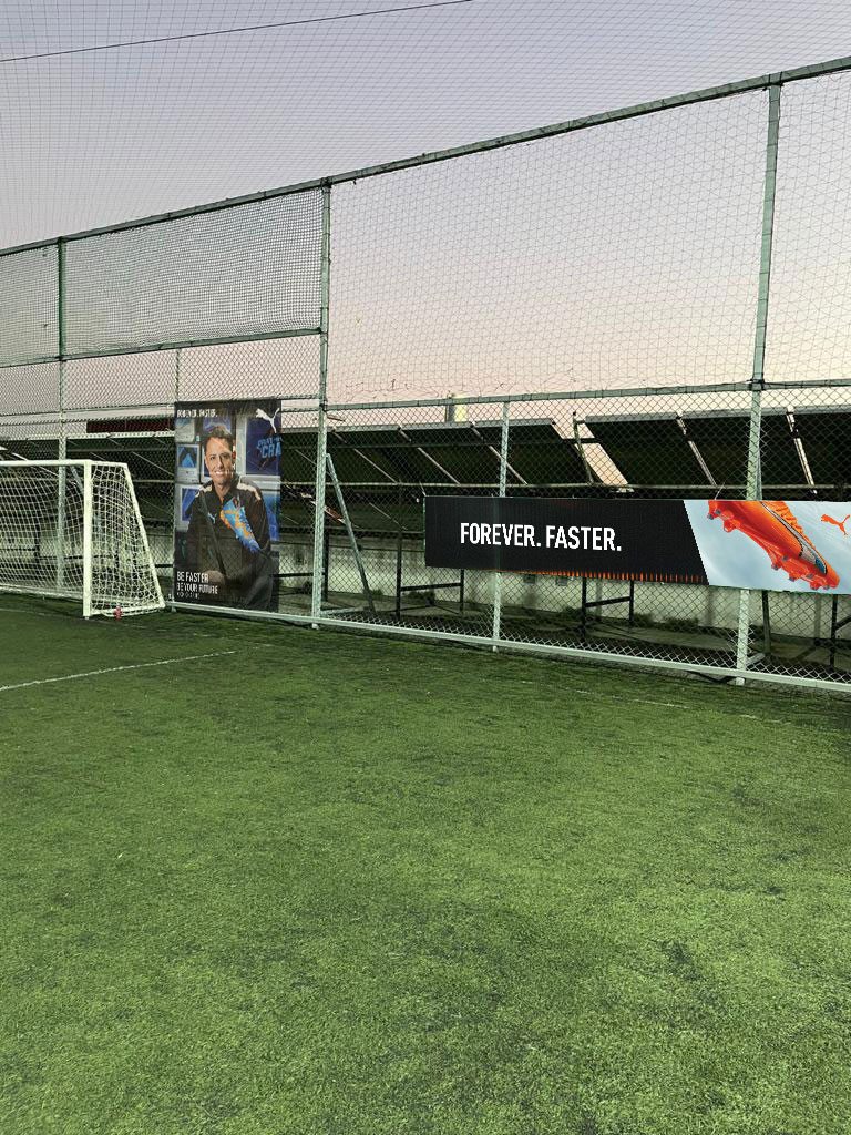 Chicharito poster and Forever Faster banner installed at the venue