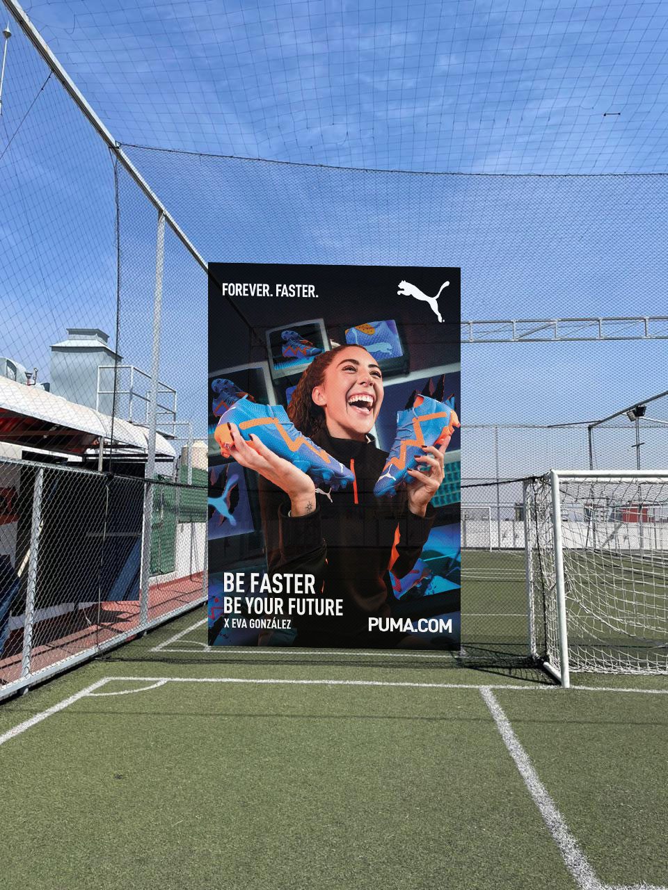 Eva González Forever Faster poster mounted on the goal frame